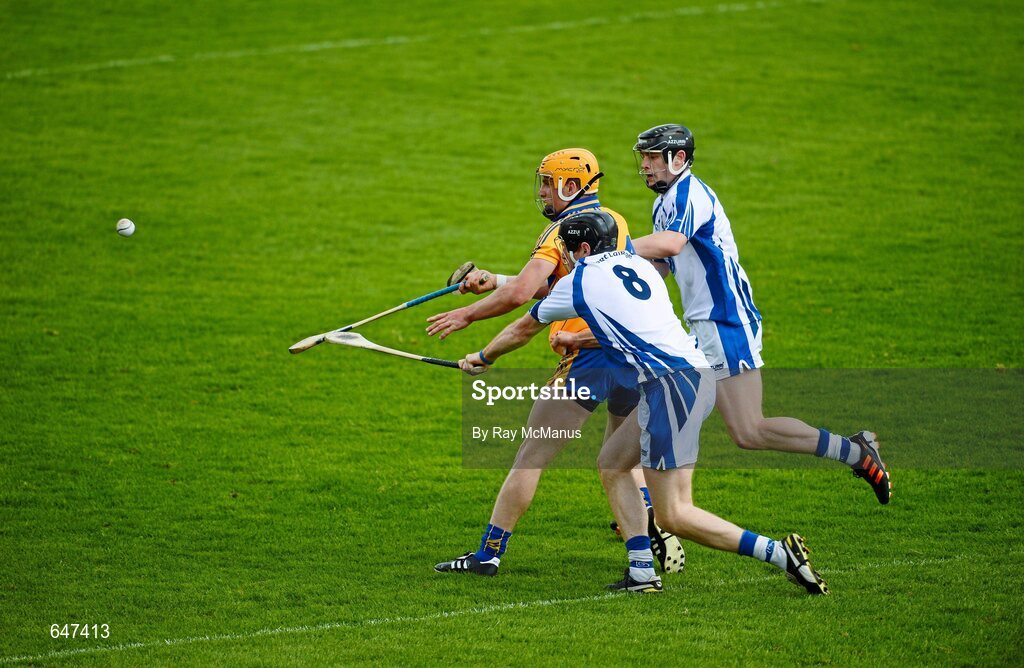 17 June 2012; John Conlon, Clare, is tackled by Kevin Moran, 8, and Philip Mahoney, Waterford. Munster GAA Hurling Senior Championship Semi-Final, Clare v Waterford, Semple Stadium, Thurles, Co. Tipperary. Picture credit: Ray McManus / SPORTSFILE