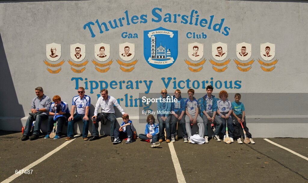 17 June 2012; Waterford supporters from the Ballyduff GAA Club, who cycled to Thurles as a fundraiser, relax outside the Thurles Sarsfields GAA Club before the game. Munster GAA Hurling Senior Championship Semi-Final, Clare v Waterford, Semple Stadium, Thurles, Co. Tipperary. Picture credit: Ray McManus / SPORTSFILE