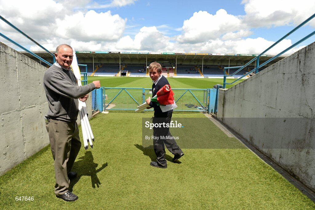 17 June 2012; Caretaker Philip Butler, right, and Donal Bergin carry flags as they set out to to mark the pitch. Munster GAA Hurling Senior Championship Semi-Final, Clare v Waterford, Semple Stadium, Thurles, Co. Tipperary. Picture credit: Ray McManus / SPORTSFILE