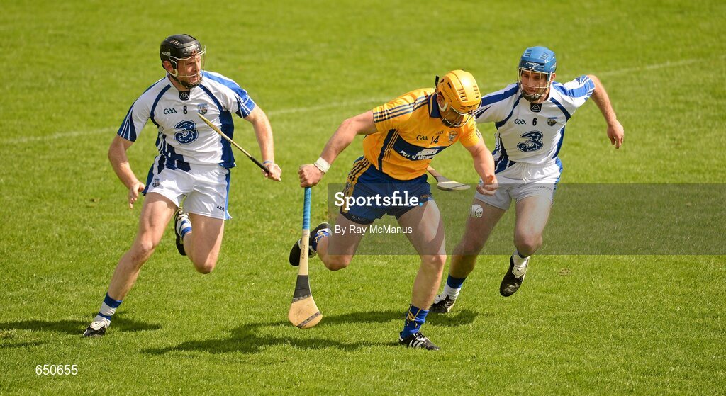 17 June 2012; John Conlon, Clare, is tackled by Nicky O'Connell, left, and James McInerney, Waterford. Munster GAA Hurling Senior Championship Semi-Final, Clare v Waterford, Semple Stadium, Thurles, Co. Tipperary. Picture credit: Ray McManus / SPORTSFILE