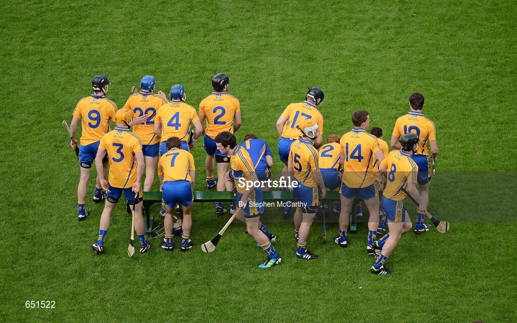 17 June 2012; The Clare team break from the team photograph. Munster GAA Hurling Senior Championship Semi-Final, Clare v Waterford, Semple Stadium, Thurles, Co. Tipperary. Picture credit: Stephen McCarthy / SPORTSFILE