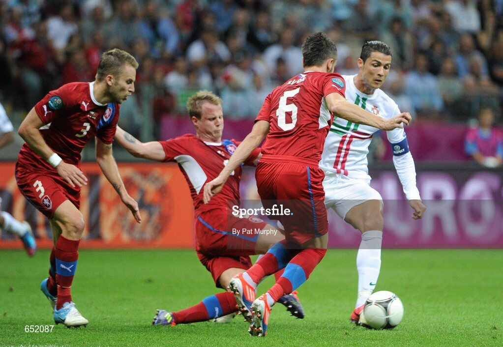 21 June 2012; Cristiano Ronaldo, Portugal, in action against, from left, Michal Kadlec, David Limbersky and Tomas Sivok, Czech Republic. UEFA EURO 2012, Quarter-Final, Czech Republic v Portugal, National Stadium, Warsaw, Poland. Picture credit: Pat Murphy / SPORTSFILE