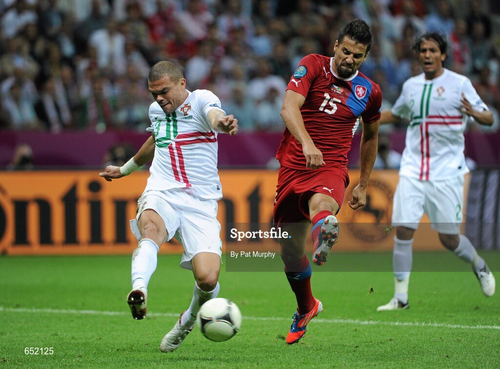 21 June 2012; Pepe, Portugal, in action against Milan Baros, Czech Republic. UEFA EURO 2012, Quarter-Final, Czech Republic v Portugal, National Stadium, Warsaw, Poland. Picture credit: Pat Murphy / SPORTSFILE