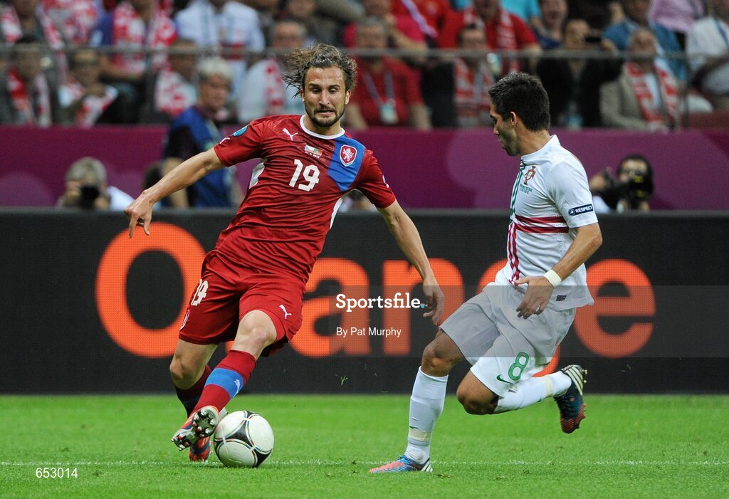 21 June 2012; Petr Jiracek, Czech Republic, in action against Joao Moutinho, Portugal. UEFA EURO 2012, Quarter-Final, Czech Republic v Portugal, National Stadium, Warsaw, Poland. Picture credit: Pat Murphy / SPORTSFILE
