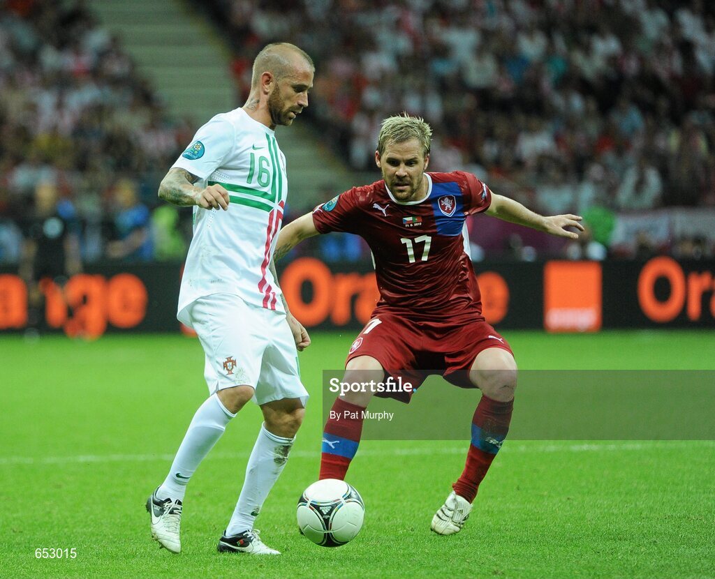 21 June 2012; Raul Meireles, Portugal, in action against Tomas Hubschmann, Czech Republic. UEFA EURO 2012, Quarter-Final, Czech Republic v Portugal, National Stadium, Warsaw, Poland. Picture credit: Pat Murphy / SPORTSFILE