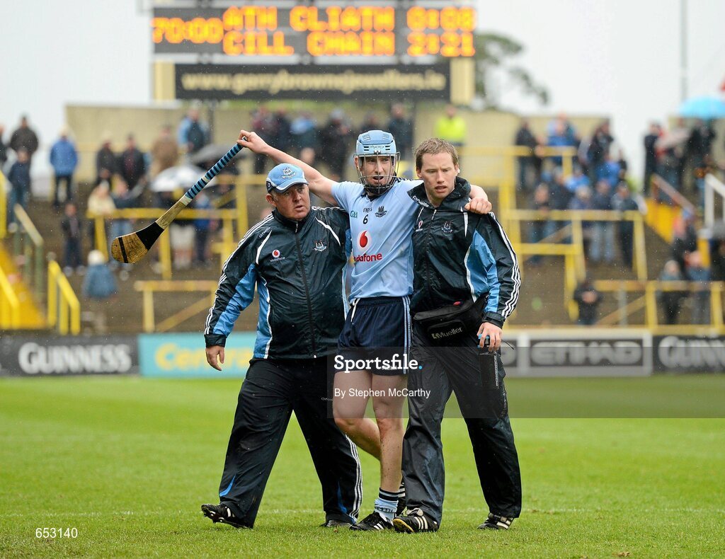 23 June 2012; Joey Boland, Dublin, is assisted from the pitch during the closing stages of the game after picking up an injury. Leinster GAA Hurling Senior Championship Semi-Final, Dublin v Kilkenny, O'Moore Park, Portlaoise, Co. Laois. Picture credit: Stephen McCarthy / SPORTSFILE