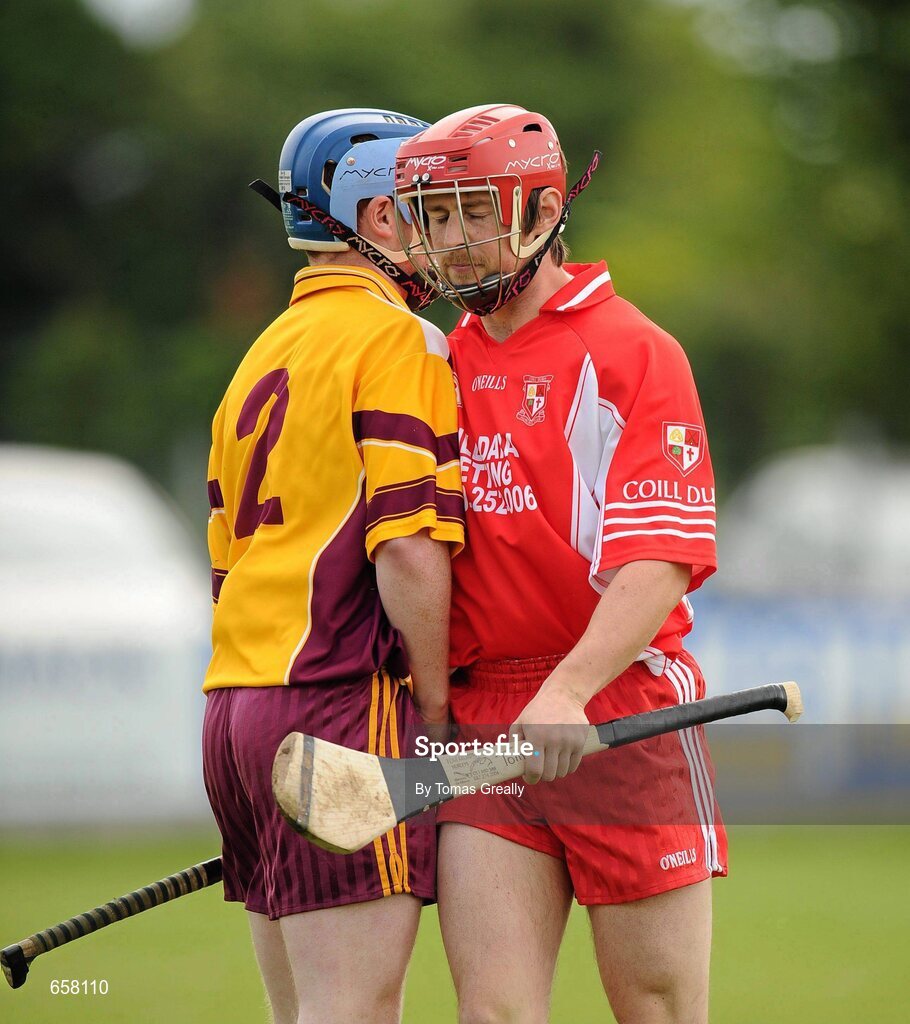 30 June 2012; Seanie Johnston, who lined out for Coill Dubh today, in action against Kieran Moran, Éire Óg. This image was taken at 16:07:24. Kildare Senior Hurling Championship Preliminary Round, Éire Óg v Coill Dubh, Clane GAA, Prosperous Road, Clane, Co. Kildare. Picture credit: Tomas Greally / SPORTSFILE