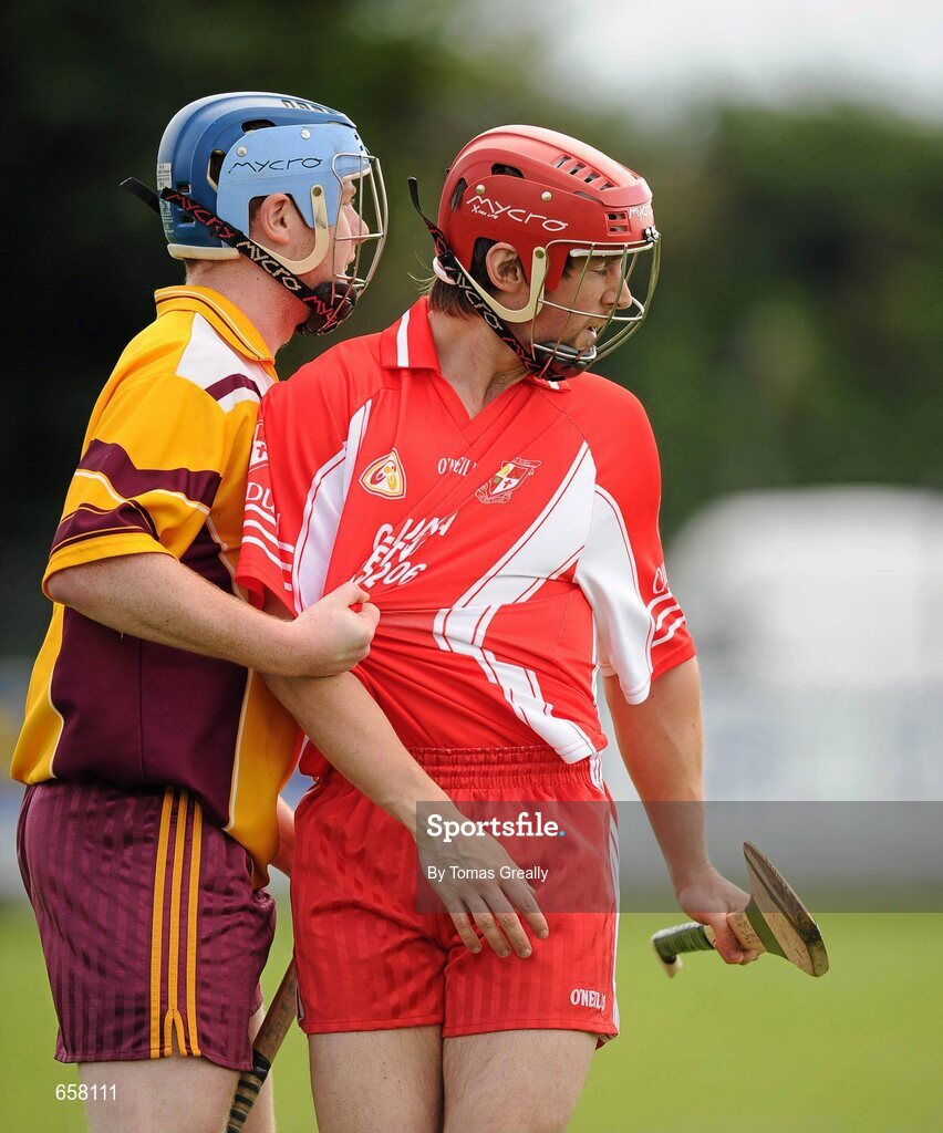 30 June 2012; Seanie Johnston, who lined out for Coill Dubh today, in action against Kieran Moran, Éire Óg. This image was taken at 16:07:28. Kildare Senior Hurling Championship Preliminary Round, Éire Óg v Coill Dubh, Clane GAA, Prosperous Road, Clane, Co. Kildare. Picture credit: Tomas Greally / SPORTSFILE