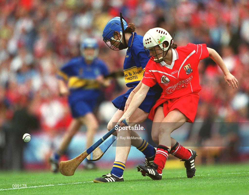 15 September 2002; Joanne O'Callaghan of Cork in action against Claire Grogan of Tipperary during the All-Ireland Senior Camogie Championship Final match between Cork and Tipperary at Croke Park in Dublin. Photo by Ray McManus/Sportsfile