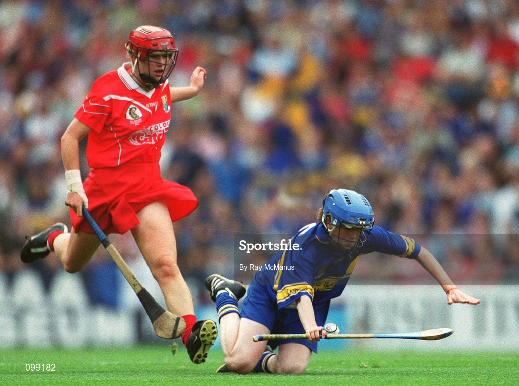 15 September 2002; Claire Grogan of Tipperary in action against Mary O'Connor of Cork during the All-Ireland Senior Camogie Championship Final match between Cork and Tipperary at Croke Park in Dublin. Photo by Ray McManus/Sportsfile