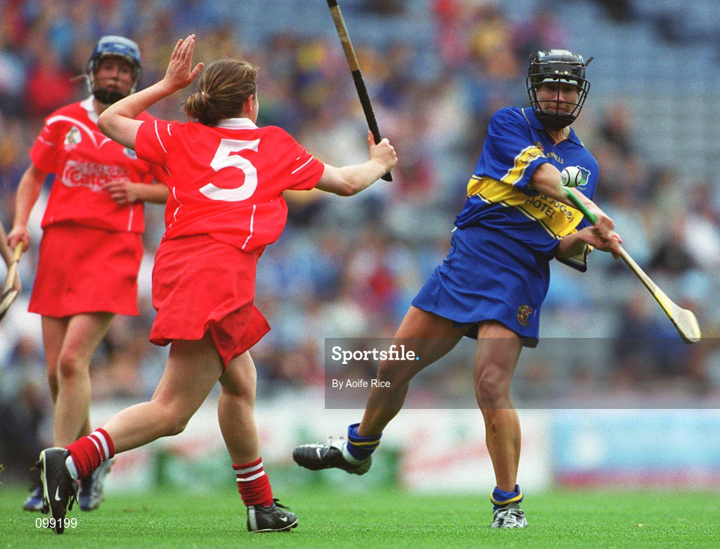 15 September 2002; Ciara Gaynor of Tipperary in action against Paula O'Connor of Cork during the All-Ireland Senior Camogie Championship Final match between Cork and Tipperary at Croke Park in Dublin. Photo by Aoife Rice/Sportsfile