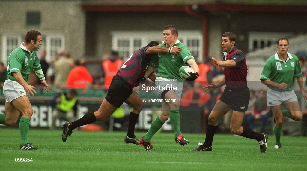 28 September 2002; Brian O'Driscoll of Ireland offloads to Kevin Maggs, under pressure from Kakha Alania of Georgia during the Rugby World Cup 2003 Qualifier match between Ireland and Georgia at Lansdowne Road in Dublin. Photo by Brendan Moran/Sportsfile