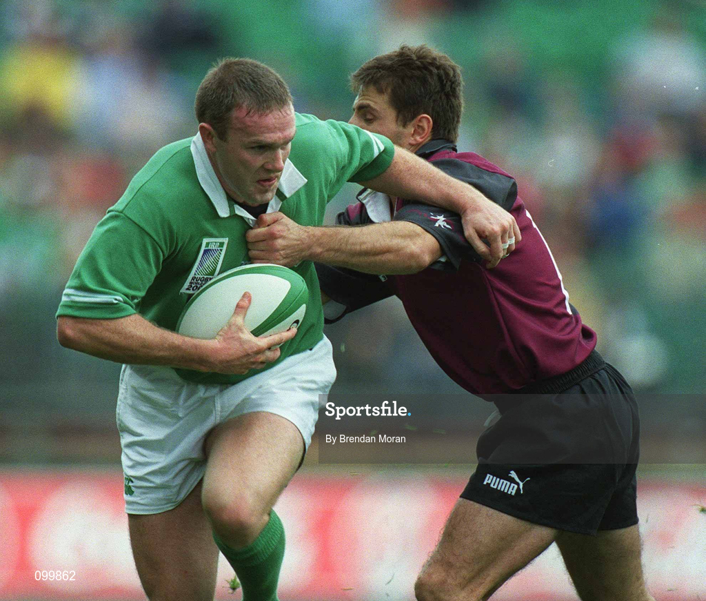 28 September 2002; Malcolm O'Kelly of Ireland is tackled by Malkhaz Urjukashbili of Georgia during the Rugby World Cup 2003 Qualifier match between Ireland and Georgia at Lansdowne Road in Dublin. Photo by Brendan Moran/Sportsfile
