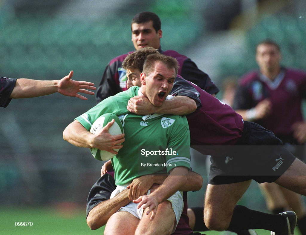 28 September 2002; Keith Gleeson of Ireland is tackled by Bessik Khamashuridze of Georgia during the Rugby World Cup 2003 Qualifier match between Ireland and Georgia at Lansdowne Road in Dublin. Photo by Brendan Moran/Sportsfile
