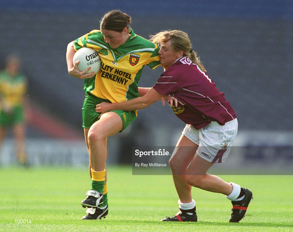 29 September 2002; Ann Doherty of Donegal is tackled by Marie O'Connell of Galway during the All-Ireland Ladies Junior Football Championship Final match between Galway and Donegal at Croke Park in Dublin. Photo by Ray McManus/Sportsfile