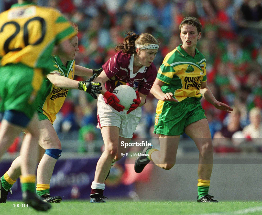 29 September 2002; Gillian Joyce of Galway in action against Lorraine O'Sullivan, left, and Charlene McHugh of Donegal during the All-Ireland Ladies Junior Football Championship Final match between Galway and Donegal at Croke Park in Dublin. Photo by Ray McManus/Sportsfile