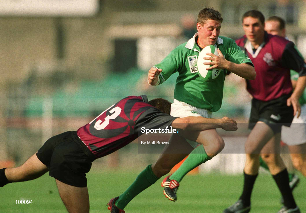 28 September 2002; Ronan O'Gara of Ireland is tackled by Tedo Zibzibade of Georgia during the Rugby World Cup 2003 Qualifier match between Ireland and Georgia at Lansdowne Road in Dublin. Photo by Matt Browne/Sportsfile