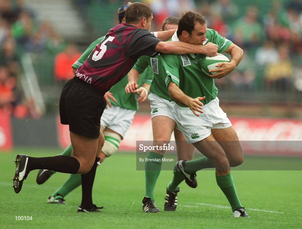 28 September 2002; Girvan Dempsey of Ireland is tackled by Bessik Khamashuridze of Georgia during the Rugby World Cup 2003 Qualifier match between Ireland and Georgia at Lansdowne Road in Dublin. Photo by Brendan Moran/Sportsfile
