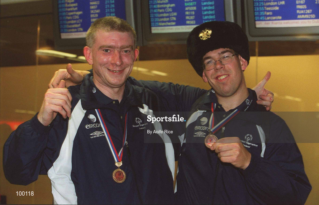 30 September 2002; Ireland's Special Olympics Basketball players Michael O'Connor, left, with team-mate Patrick Nolan, from Wexford, who competed at the European Basketball Tournament in Moscow, pictured with their medals, on their arrival home at Dublin Airport in Dublin. Photo by Aoife Rice/Sportsfile