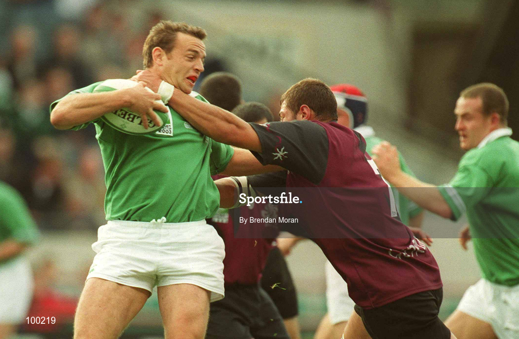 28 September 2002; Rob Henderson of Ireland is tackled by George Chkhaidze of Georgia during the Rugby World Cup 2003 Qualifier match between Ireland and Georgia at Lansdowne Road in Dublin. Photo by Brendan Moran/Sportsfile