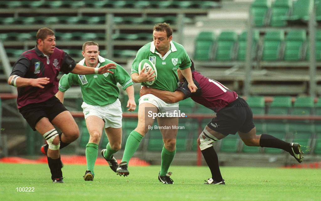 28 September 2002; Rob Henderson of Ireland is tackled by George Chkhaidze, left, and Paul Jimsheladze of Georgia during the Rugby World Cup 2003 Qualifier match between Ireland and Georgia at Lansdowne Road in Dublin. Photo by Brendan Moran/Sportsfile