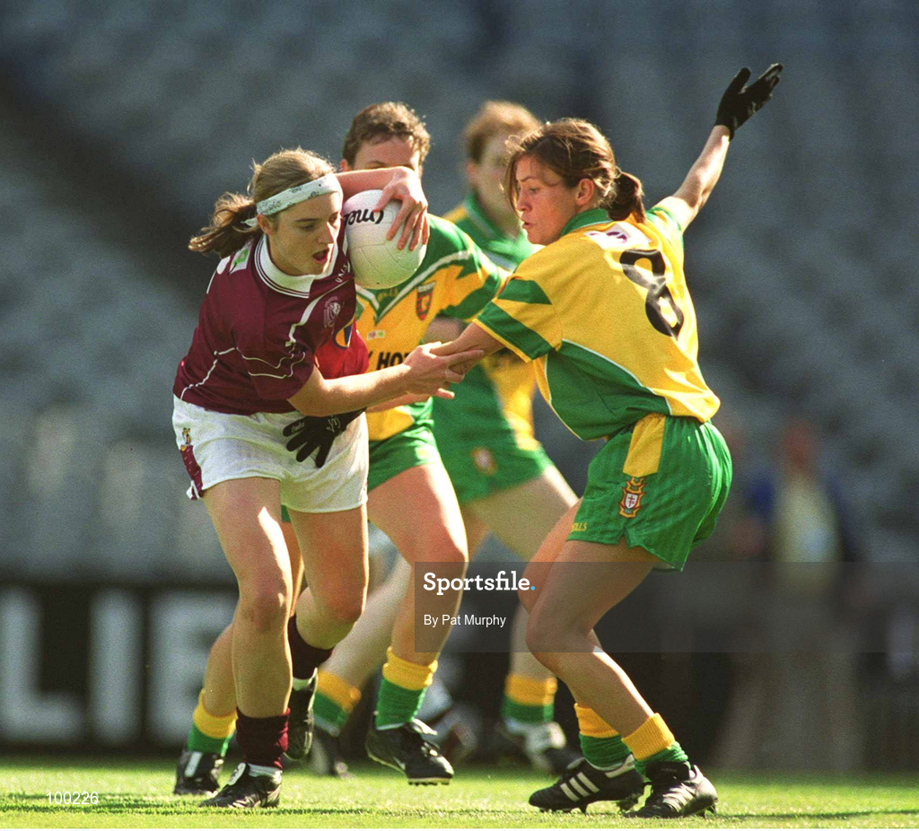 29 September 2002; Annette Clarke of Galway is tackled by Nicola Lacey of Donegal during the All-Ireland Ladies Junior Football Championship Final match between Galway and Donegal at Croke Park in Dublin. Photo by Pat Murphy/Sportsfile