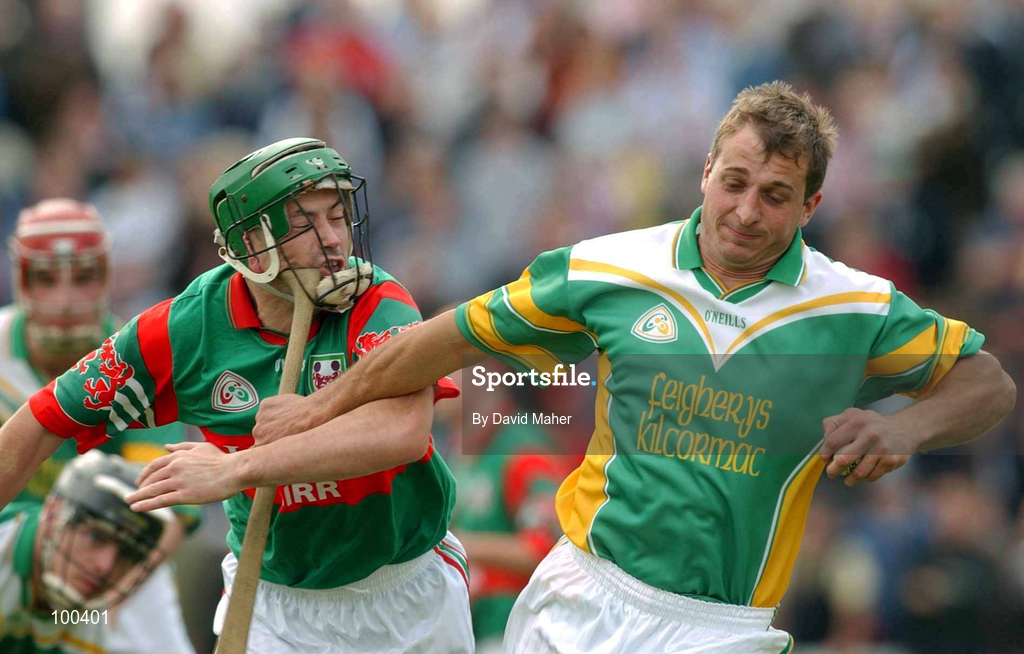 29 September 2002; Henry Kilmartin of Kilcormac / Killoughey in action against Liam Power of Birr during the Offaly County Senior Hurling Final match between Birr and Kilcormac / Kelloughey at St. Brendan's Park in Birr, Offaly. Photo by David Maher/Sportsfile