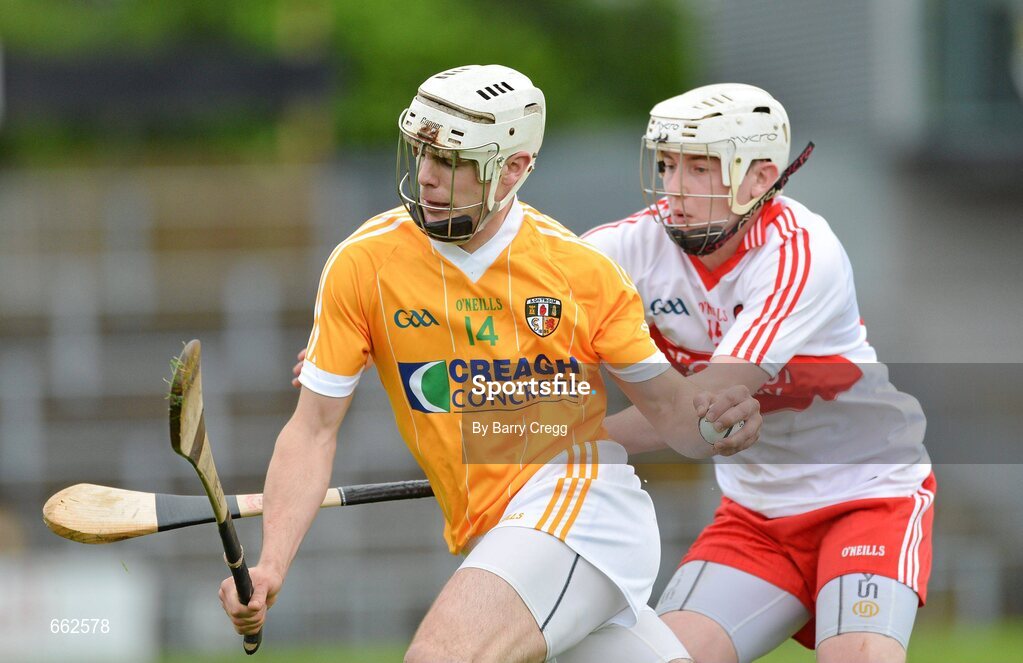 8 July 2012; Neil McManus, Antrim, in action against Paddy Henry, Derry. Ulster GAA Hurling Senior Championship Final, Antrim v Derry, Casement Park, Belfast, Co. Antrim. Picture credit: Barry Cregg / SPORTSFILE