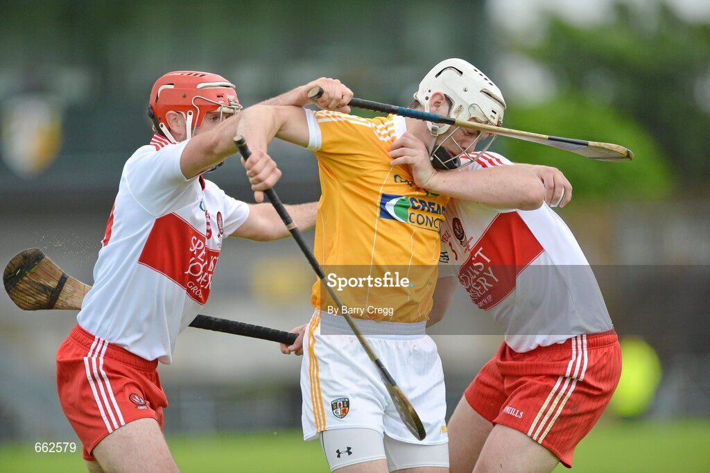 8 July 2012; Neil McManus, Antrim, in action against Mark Craig, left, and Conor Quinn, right, Derry. Ulster GAA Hurling Senior Championship Final, Antrim v Derry, Casement Park, Belfast, Co. Antrim. Picture credit: Barry Cregg / SPORTSFILE