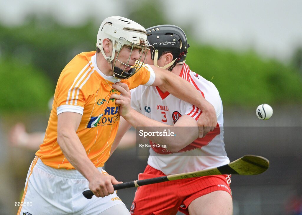 8 July 2012; Neil McManus, Antrim, in action against Conor Quinn, Derry. Ulster GAA Hurling Senior Championship Final, Antrim v Derry, Casement Park, Belfast, Co. Antrim. Picture credit: Barry Cregg / SPORTSFILE