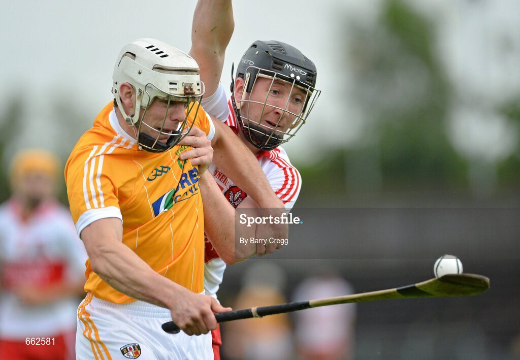 8 July 2012; Neil McManus, Antrim, in action against Conor Quinn, Derry. Ulster GAA Hurling Senior Championship Final, Antrim v Derry, Casement Park, Belfast, Co. Antrim. Picture credit: Barry Cregg / SPORTSFILE