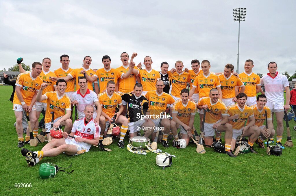 8 July 2012; The Antrim team celebrate their victory with the cup after the game. Ulster GAA Hurling Senior Championship Final, Antrim v Derry, Casement Park, Belfast, Co. Antrim. Picture credit: Barry Cregg / SPORTSFILE