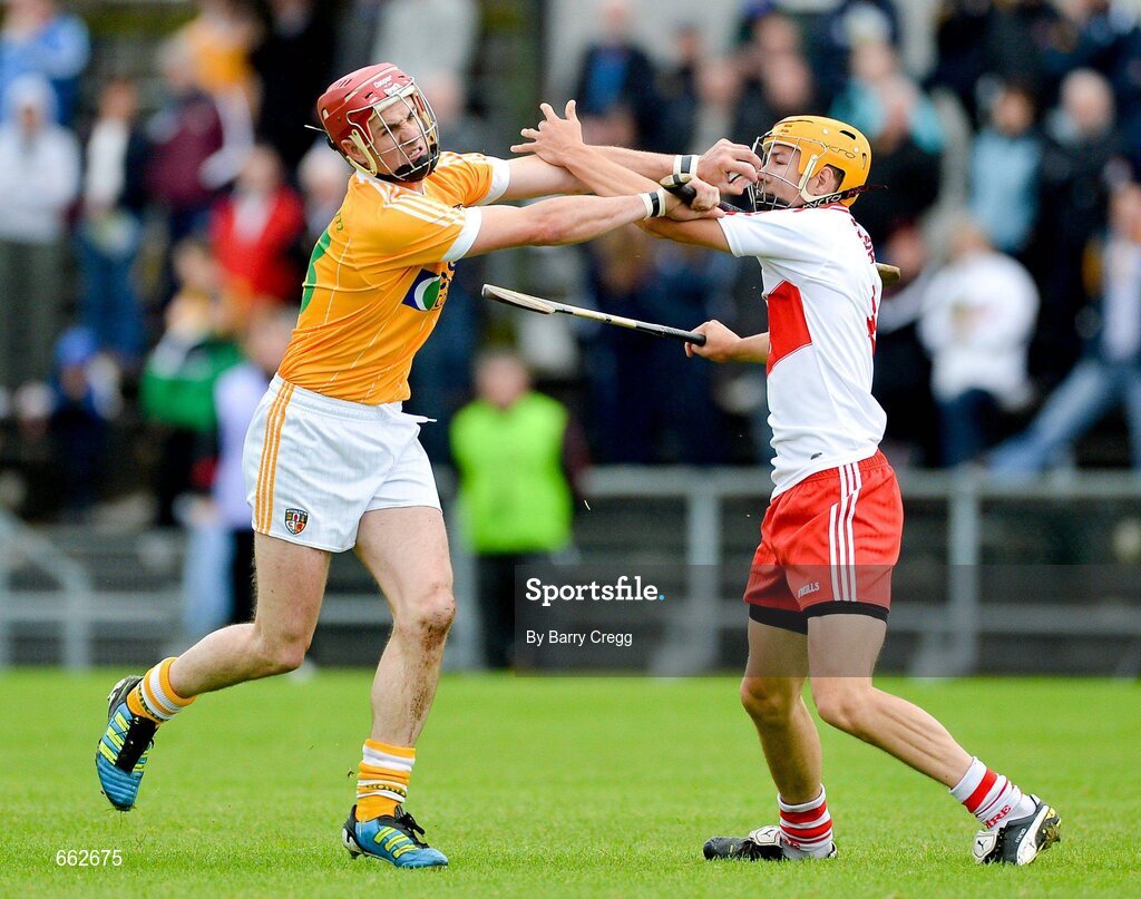 8 July 2012; Liam Watson, Antrim, in action against Michael Warnock, Derry. Ulster GAA Hurling Senior Championship Final, Antrim v Derry, Casement Park, Belfast, Co. Antrim. Picture credit: Barry Cregg / SPORTSFILE