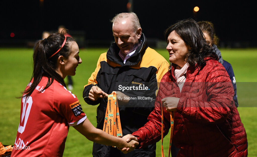 23 September 2017; Frances Smith, FAI Women's Football Committee vice-chairperson, in the company of Tom Dennigan, General Manager, Continental Tyres Ireland, presents a medal to Roma McLoughlin of Shelbourne Ladies following the Continental Tyres Women's National League Cup Final match between Peamount United and Shelbourne Ladies at Greenogue in Dublin. Photo by Stephen McCarthy/Sportsfile