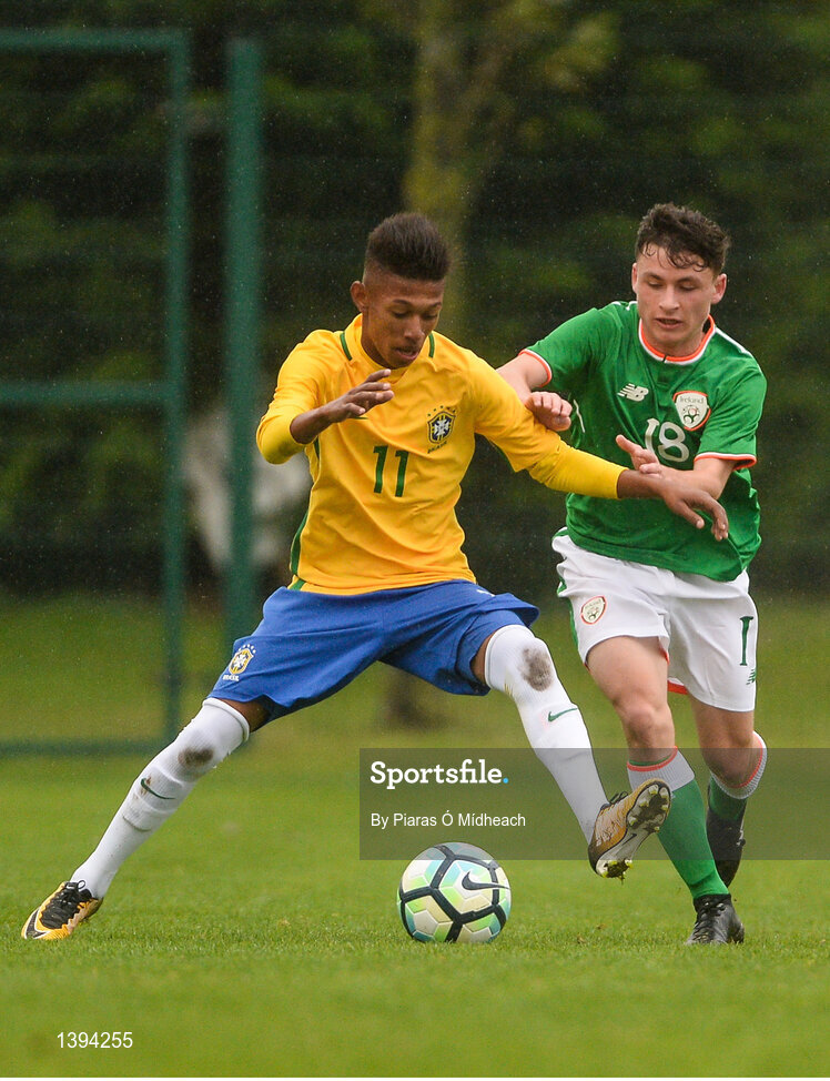 27 September 2017; Carlos Antônio de Oliveira Costa of Brazil in action against Paddy Moore of Ireland during the International Friendly match between Republic of Ireland and Brazil at the AUL Complex in Dublin. Photo by Piaras Ó Mídheach/Sportsfile