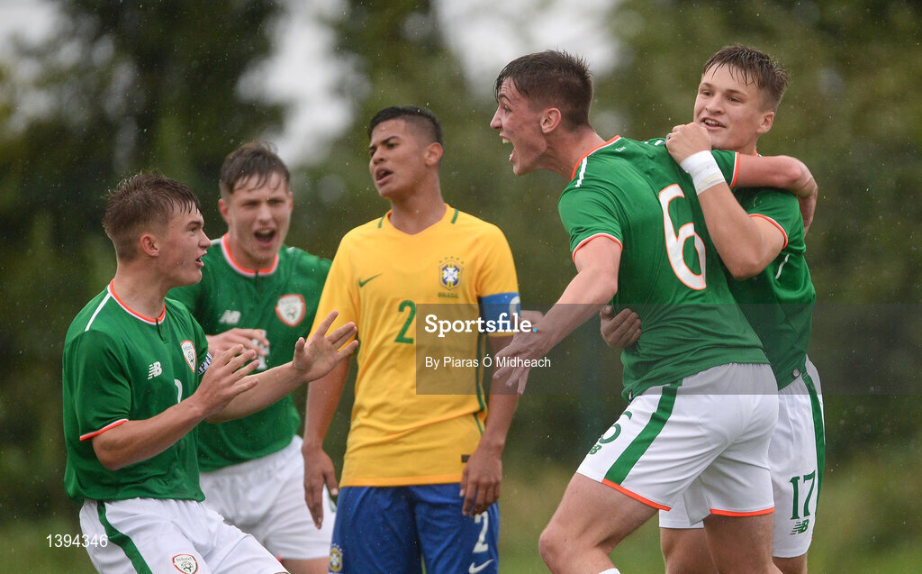 27 September 2017; Conor Power, 6, of Republic of Ireland celebrates with team-mates, from left, Séamas Keogh, Cian Kelly and Matt Everitt after scoring his side's first goal during the International Friendly match between Republic of Ireland and Brazil at the AUL Complex in Dublin. Photo by Piaras Ó Mídheach/Sportsfile