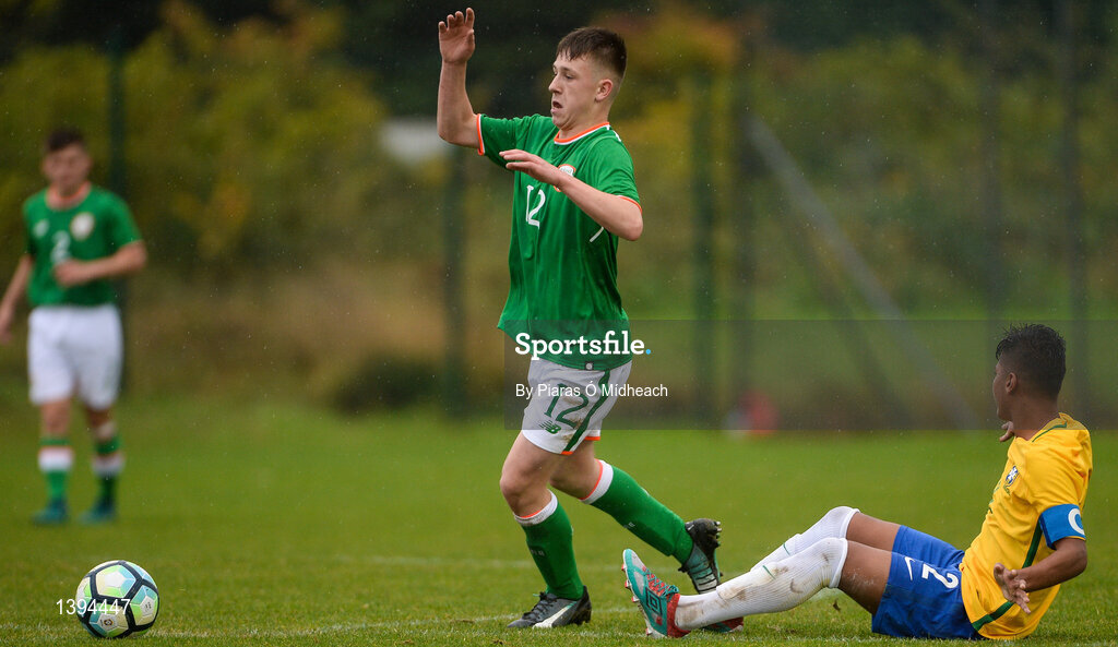 27 September 2017; Ronan McKinley of Republic of Ireland gets past Cadu of Brazil during the International Friendly match between Republic of Ireland and Brazil at the AUL Complex in Dublin. Photo by Piaras Ó Mídheach/Sportsfile