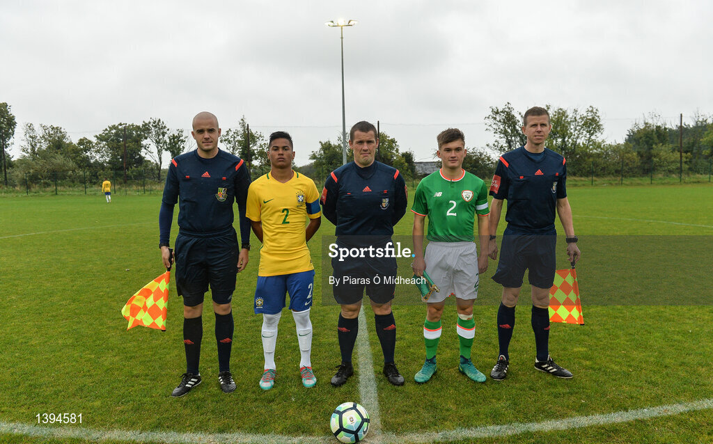 27 September 2017; Referee David Dunne and his officials Mark Patchell and Mark Carey with team captains Cadu of Brazil and Séamas Keogh of Republic of Ireland during the International Friendly match between Republic of Ireland and Brazil at the AUL Complex in Dublin. Photo by Piaras Ó Mídheach/Sportsfile