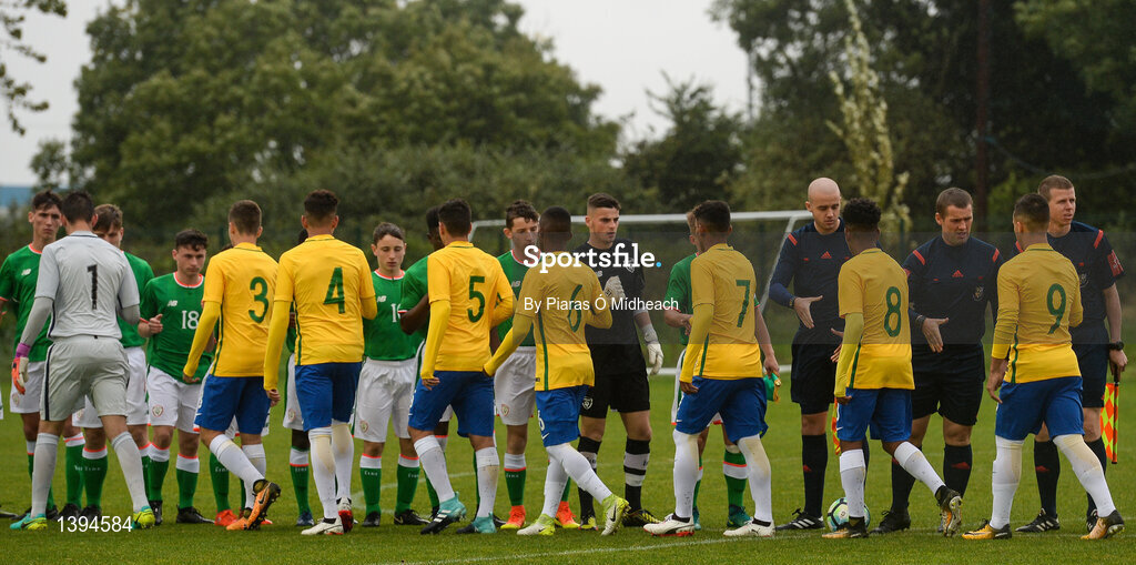 27 September 2017; Republic of Ireland and Brazil players shake hands with officials before the International Friendly match between Republic of Ireland and Brazil at the AUL Complex in Dublin. Photo by Piaras Ó Mídheach/Sportsfile