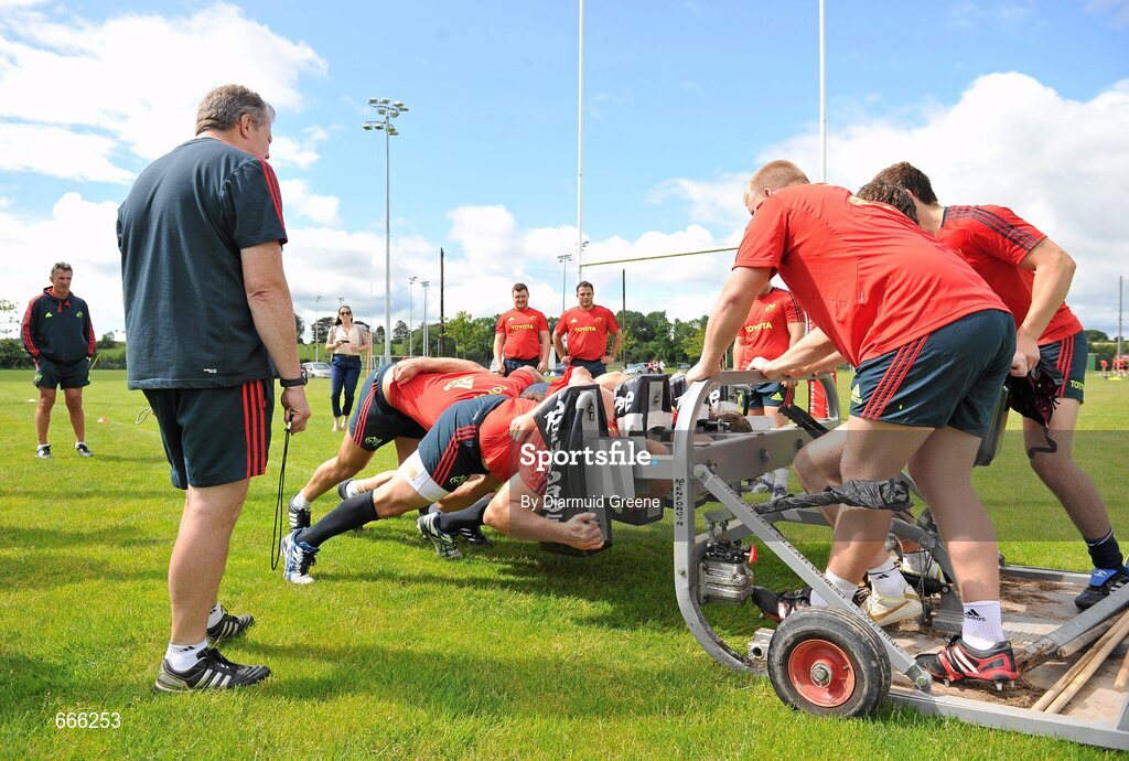 18 July 2012; Munster players practice their scrummaging, watched by scrum coach Paul McCarthy and head coach Rob Penney, left, during squad training ahead of the 2012/13 season. Munster Rugby Squad Training, Cork Institute of Technology, Bishopstown, Cork. Picture credit: Diarmuid Greene / SPORTSFILE