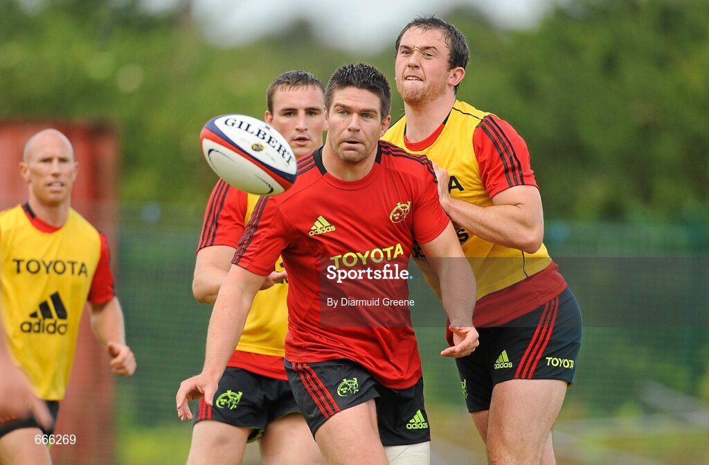 18 July 2012; Munster's Billy Holland is tackled by Brian Hayes, right, during squad training ahead of the 2012/13 season. Munster Rugby Squad Training, Cork Institute of Technology, Bishopstown, Cork. Picture credit: Diarmuid Greene / SPORTSFILE