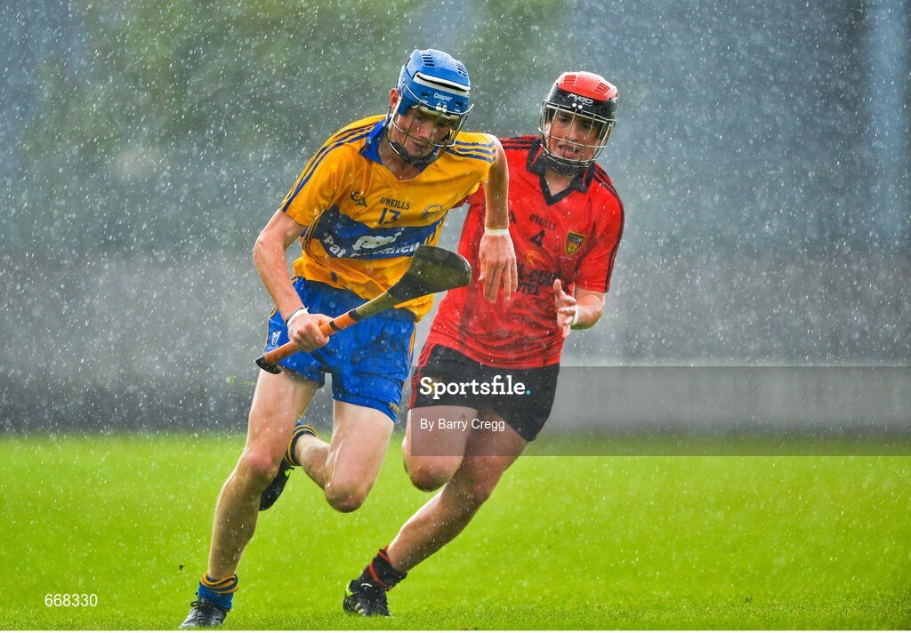 28 July 2012; Bobby Duggan, Clare, in action against Caolan Taggart, Down. Electric Ireland GAA Hurling Minor Championship Quarter-Final, Down v Clare, Cusack Park, Mullingar, Co. Westmeath. Picture credit: Barry Cregg / SPORTSFILE