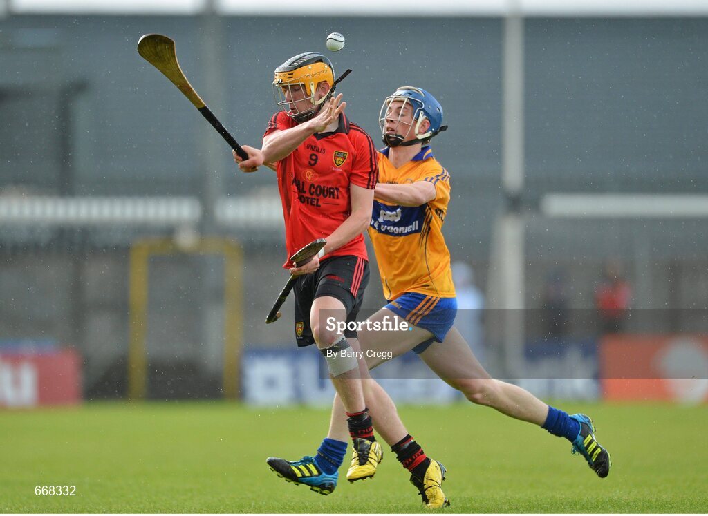 28 July 2012; Chris Egan, Down, in action against Aidan O'Gorman, Clare. Electric Ireland GAA Hurling Minor Championship Quarter-Final, Down v Clare, Cusack Park, Mullingar, Co. Westmeath. Picture credit: Barry Cregg / SPORTSFILE