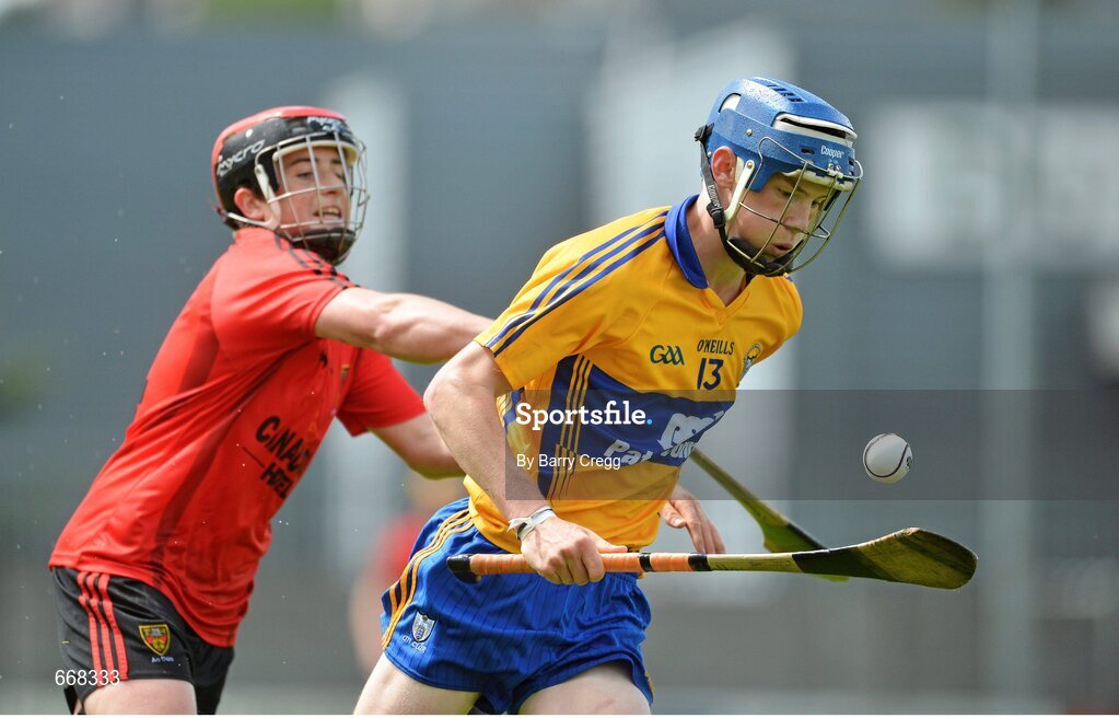 28 July 2012; Bobby Duggan, Clare, in action against Caolan Taggart, Down. Electric Ireland GAA Hurling Minor Championship Quarter-Final, Down v Clare, Cusack Park, Mullingar, Co. Westmeath. Picture credit: Barry Cregg / SPORTSFILE