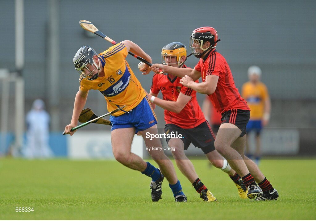28 July 2012; Niall Deasy, Clare, in action against Chris Egan, left, and Gareth O'Neill, Down. Electric Ireland GAA Hurling Minor Championship Quarter-Final, Down v Clare, Cusack Park, Mullingar, Co. Westmeath. Picture credit: Barry Cregg / SPORTSFILE