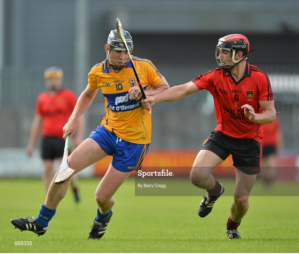 28 July 2012; Niall Deasy, Clare, in action against Gareth O'Neill, Down. Electric Ireland GAA Hurling Minor Championship Quarter-Final, Down v Clare, Cusack Park, Mullingar, Co. Westmeath. Picture credit: Barry Cregg / SPORTSFILE