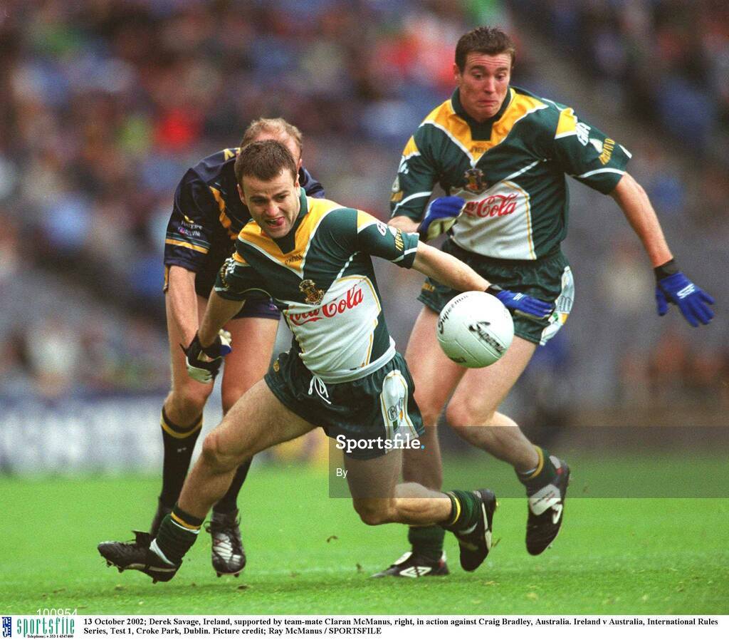 13 October 2002; Derek Savage, Ireland, supported by team-mate CIaran McManus, right, in action against Craig Bradley, Australia. Ireland v Australia, International Rules Series, Test 1, Croke Park, Dublin. Picture credit; Ray McManus / SPORTSFILE