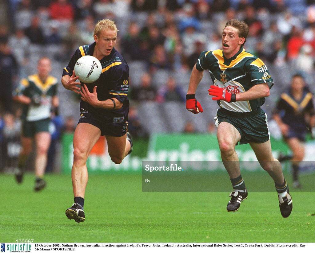 13 October 2002; Nathan Brown, Australia, in action against Ireland's Trevor Giles. Ireland v Australia, International Rules Series, Test 1, Croke Park, Dublin. Picture credit; Ray McManus / SPORTSFILE