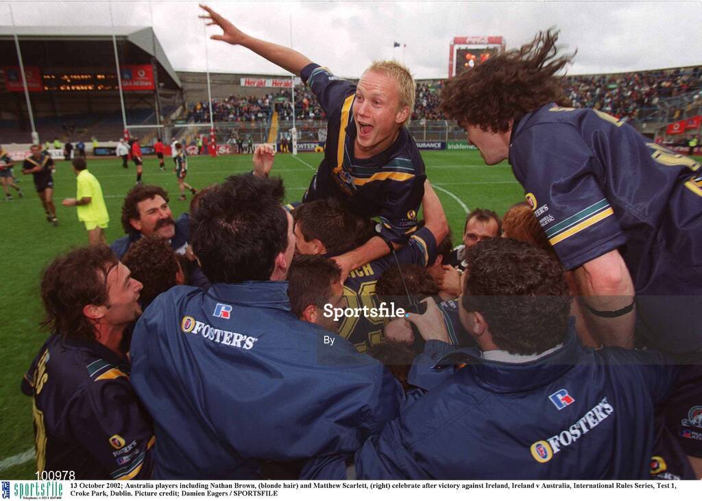 13 October 2002; Australia players including Nathan Brown, (blonde hair) and Matthew Scarlett, (right) celebrate after victory against Ireland, Ireland v Australia, International Rules Series, Test 1, Croke Park, Dublin. Picture credit; Damien Eagers / SPORTSFILE
