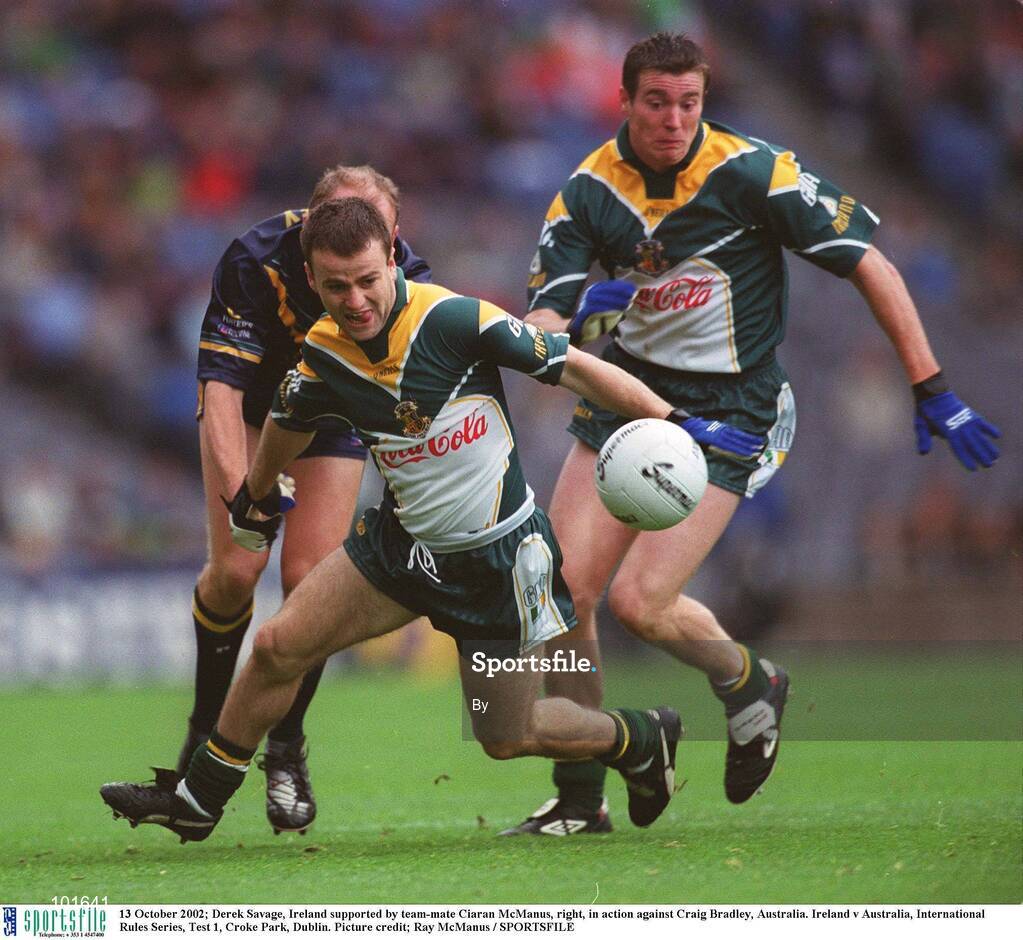 13 October 2002; Derek Savage, Ireland supported by team-mate Ciaran McManus, right, in action against Craig Bradley, Australia. Ireland v Australia, International Rules Series, Test 1, Croke Park, Dublin. Picture credit; Ray McManus / SPORTSFILE
